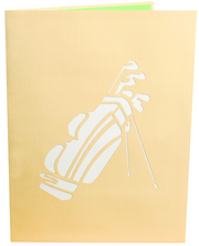 Front cover of card with light brown color features golf clubs in a bag design
