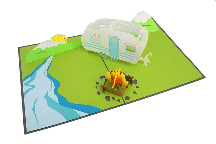 Pop-Up Card Features RV, Campfire, Mountains, and River