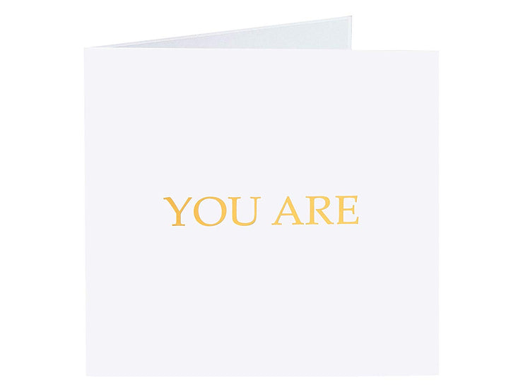 Front cover of card with light grey color features "You are" note