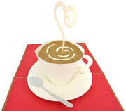 PopLife card features coffee cup and saucer with a spoon