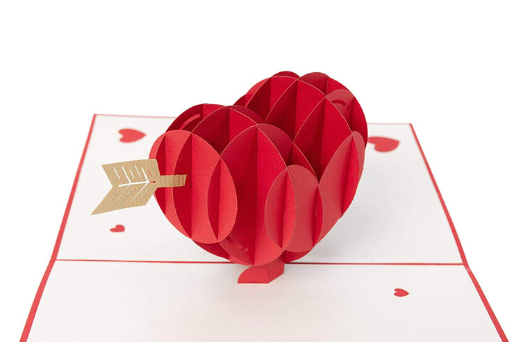 Card features red heart pierced by an arrow