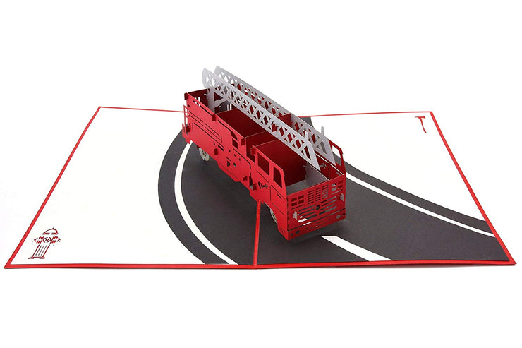 Red fire truck, firefighting vehicle speeding down a road