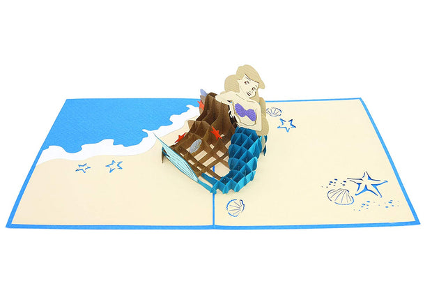 Complete with off-shore rock, seashells and starfishes pop-up
