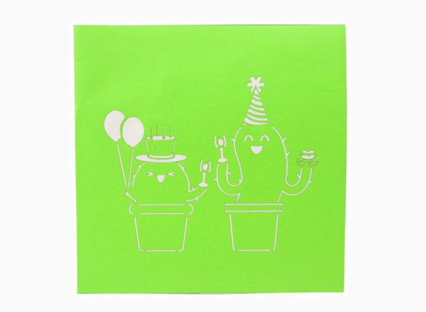 Front cover of card with green color features two cactus party