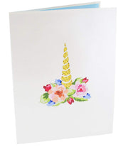 Front cover of card with light grey color features unicorn horn with colorful flowers around it
