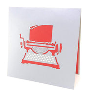 Front cover of card with grey color features typewriter