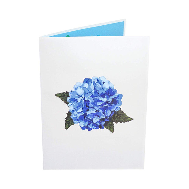 Front cover of card with light gray color features blue hydrangea flower