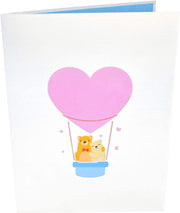 Front cover of card with light grey color features a heart pink balloon