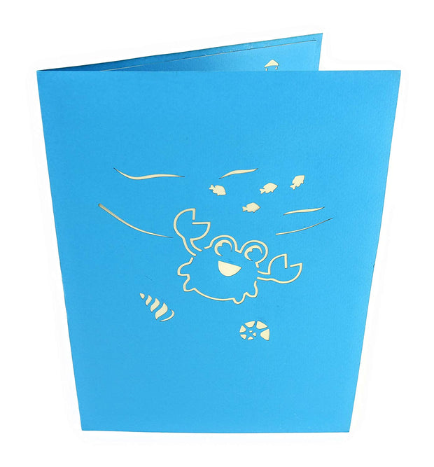 Front cover of card with blue color features crab and other marine life