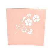 Front cover of card with pink color features Sakura flower