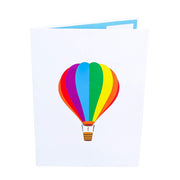 Front cover of card with light grey color features rainbow colored hot air balloon design