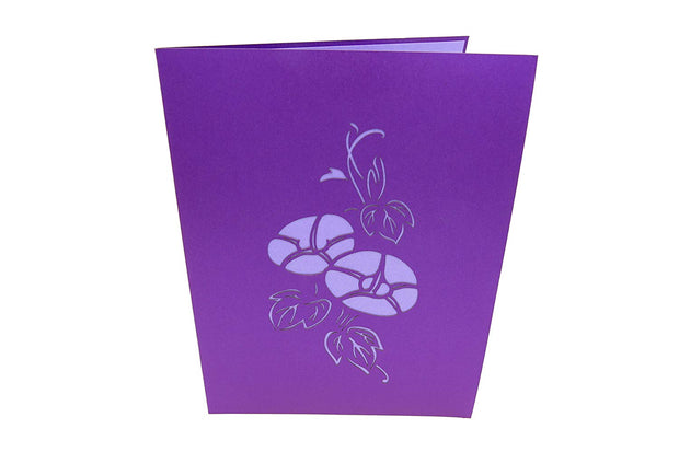 Front cover of card with purple color features iris flowers