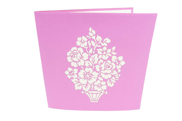 Front cover of card with purple color features beautiful flowers in a vase